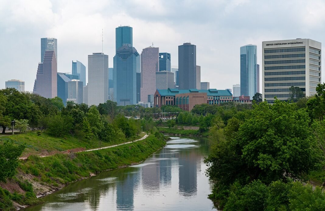 Moving to Texas in 2026: Complete Relocation Guide for New Residents Houston Texas downtown skyline with modern skyscrapers under blue sky, 2019
