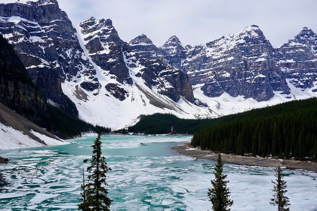 Moving to Alberta in 2026: Complete Relocation Guide Moraine Lake Banff National Park Alberta Canada turquoise water Rocky Mountains relocation 2026