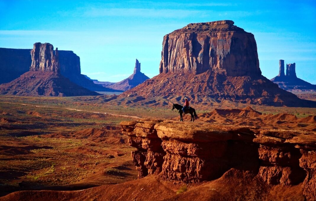 American Southwest Road Trip: The Ultimate 2-Week Itinerary Monument Valley Arizona USA dramatic red rock buttes American Southwest road trip destination 2026