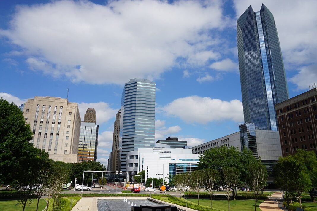 Moving to Oklahoma in 2026: Complete Relocation Guide Oklahoma City skyline with downtown skyscrapers and Devon Tower, May 2016