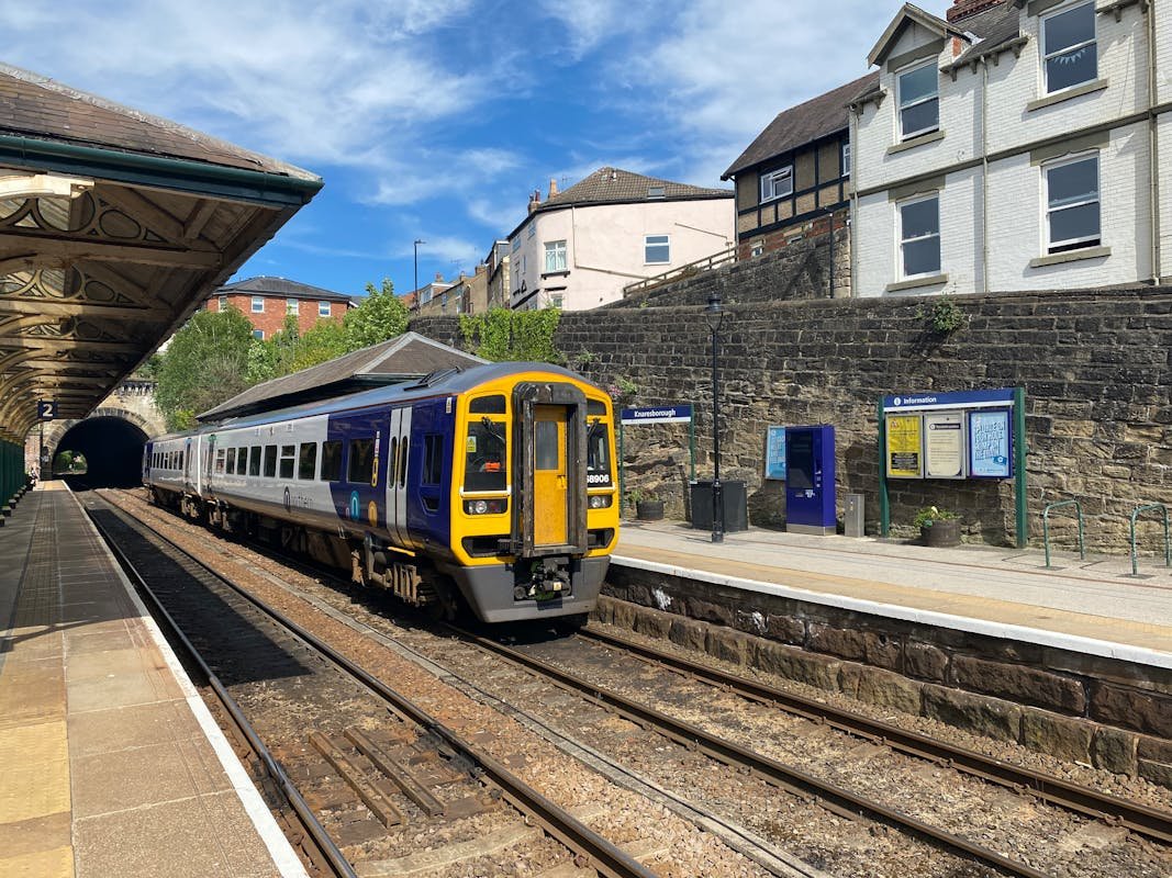 UK Transportation Guide: How to Get Around Britain Like a Local British train at station Knaresborough Yorkshire England UK railway travel guide getting around Britain
