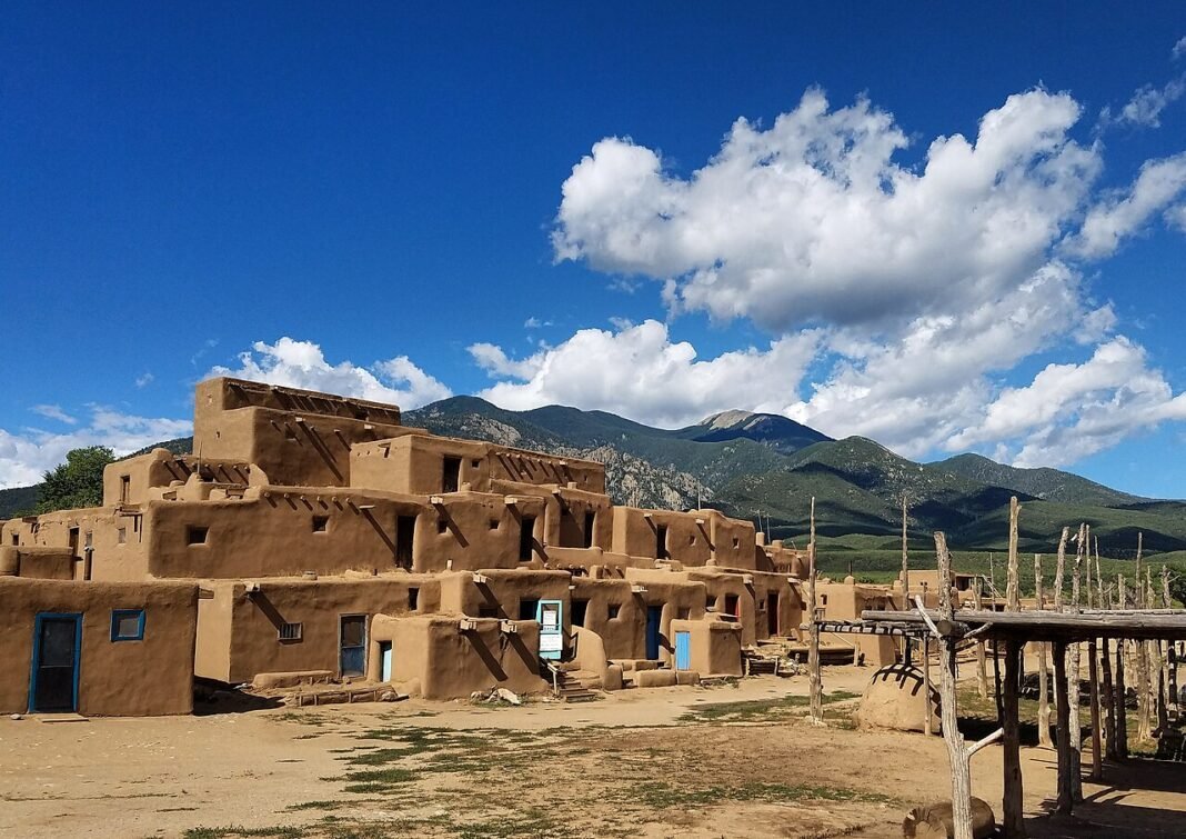 New Mexico Travel Guide 2026: Santa Fe, White Sands, and the Land of Enchantment Taos Pueblo UNESCO World Heritage Site ancient adobe dwellings New Mexico travel guide 2026