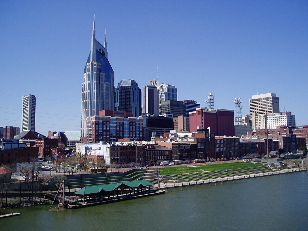Best Places to Live in Tennessee 2026: Nashville, Knoxville, Chattanooga, and More Nashville Tennessee downtown skyline Cumberland River city panorama best places to live 2026