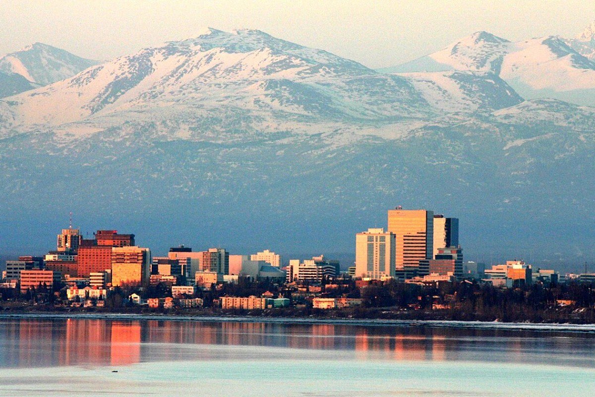 Best Places to Visit in Alaska: Your Ultimate Travel Guide Anchorage Alaska city skyline with Cook Inlet and Chugach Mountains in background