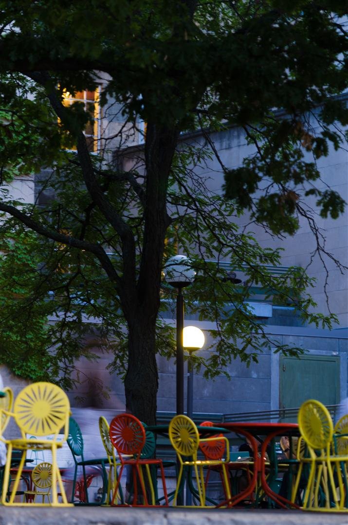 Cost of Living in Wisconsin 2026: Midwest Value with Great Lakes Access University of Wisconsin Union Terrace Madison Lake Mendota sunset chairs