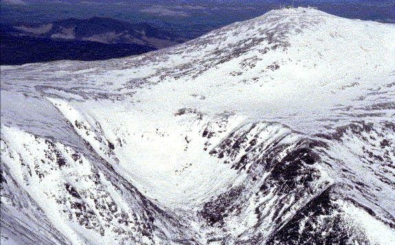 Moving to New Hampshire in 2026: Complete Relocation Guide Tuckerman Ravine aerial view Mount Washington New Hampshire White Mountains alpine bowl
