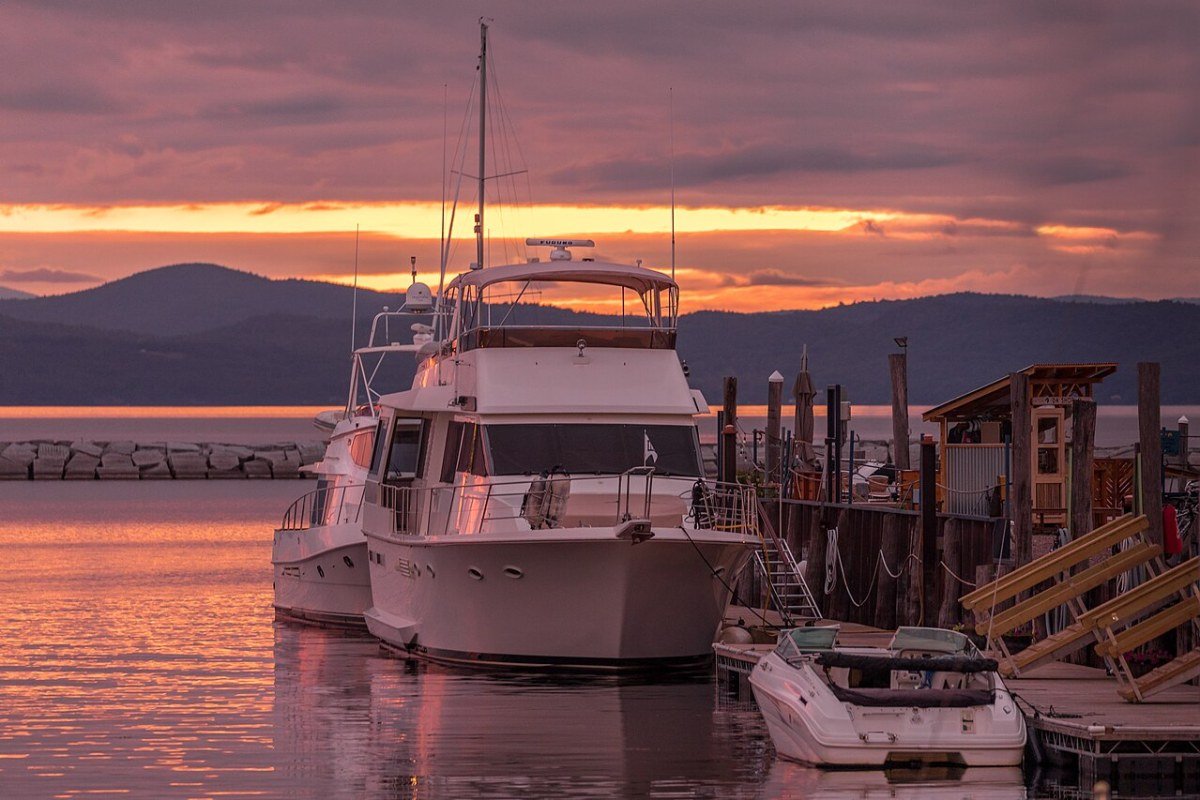 Cost of Living in Vermont 2026: Rural New England Premium Burlington Vermont harbor waterfront Lake Champlain sunset
