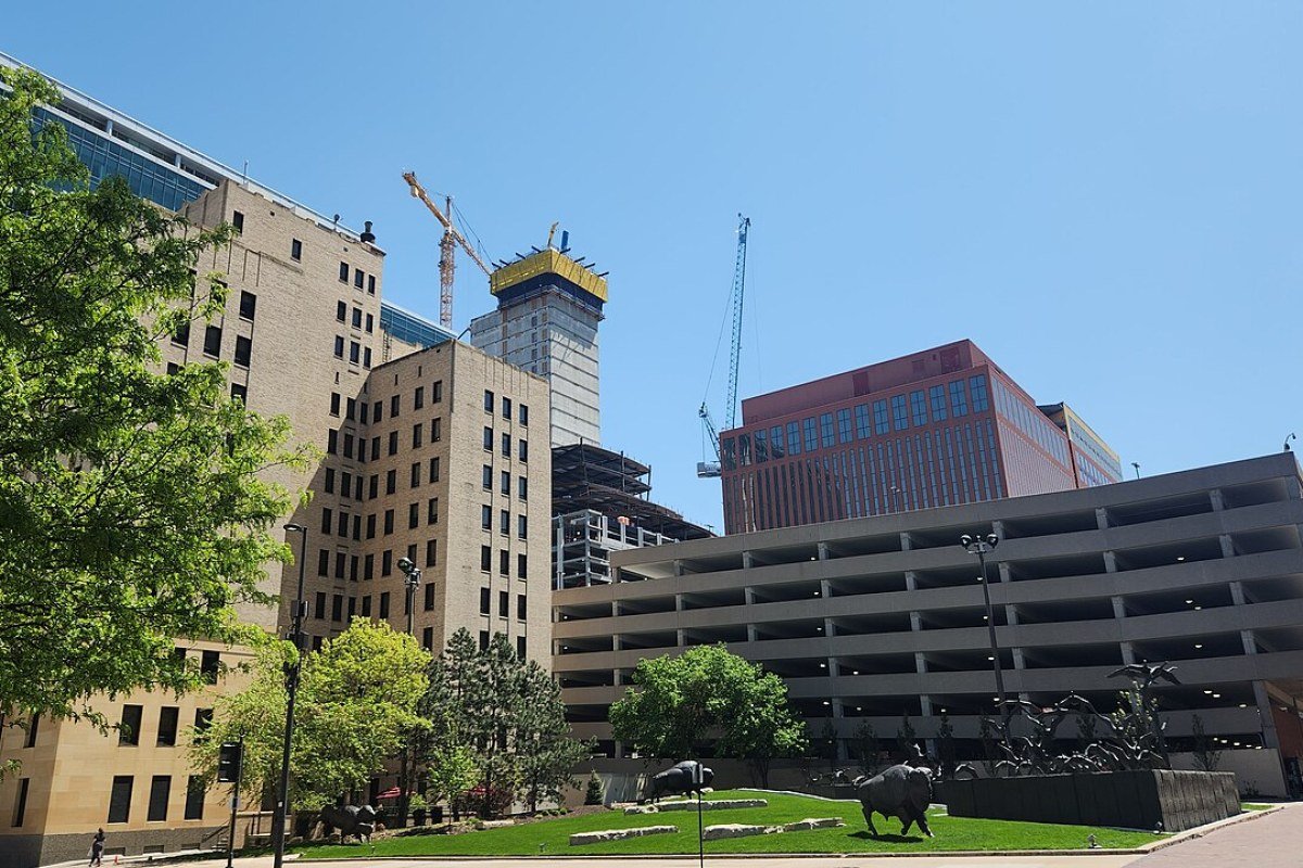 Cost of Living in Nebraska 2026: Midwest Value in Americas Heartland Downtown Omaha Nebraska skyline Missouri River Old Market district