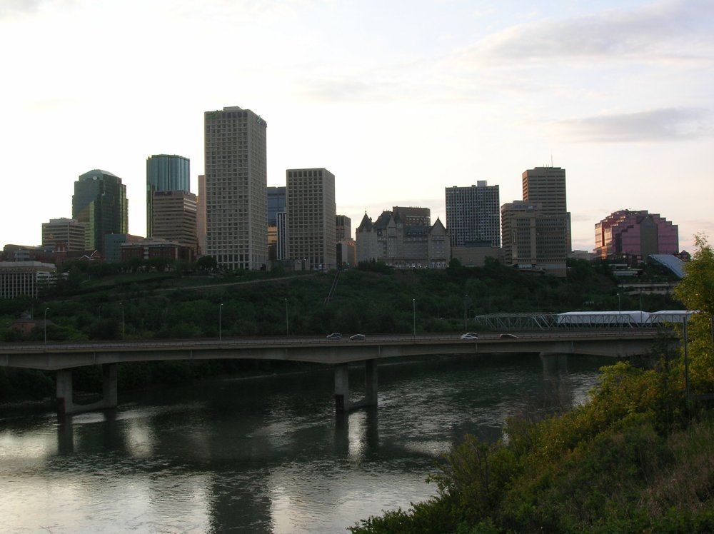Moving to Alberta in 2026: Complete Relocation Guide Edmonton city skyline along North Saskatchewan River Alberta Canada