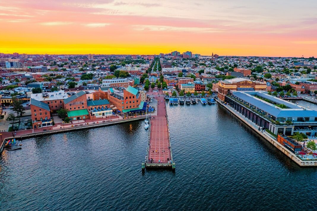 Cost of Living in Maryland 2026: DC Suburbs Premium and Baltimore’s Value Aerial view of Fell's Point historic waterfront neighborhood Baltimore Maryland 2022