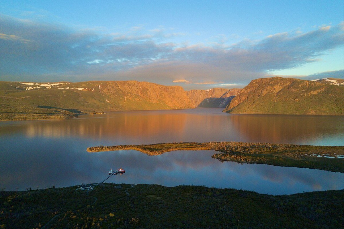 Newfoundland and Labrador Travel Guide 2026: St. John’s, Gros Morne, and the Edge of the World Western Brook Pond fjord at sunset in Gros Morne National Park Newfoundland Canada