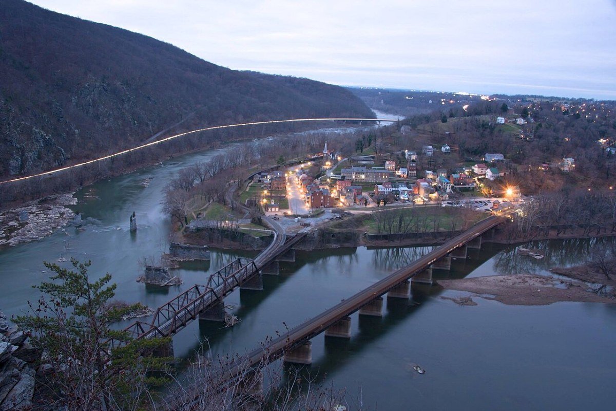 West Virginia Travel Guide 2026: New River Gorge, Seneca Rocks, and Appalachian Wilderness Harpers Ferry West Virginia viewed from Maryland Heights Potomac and Shenandoah rivers confluence