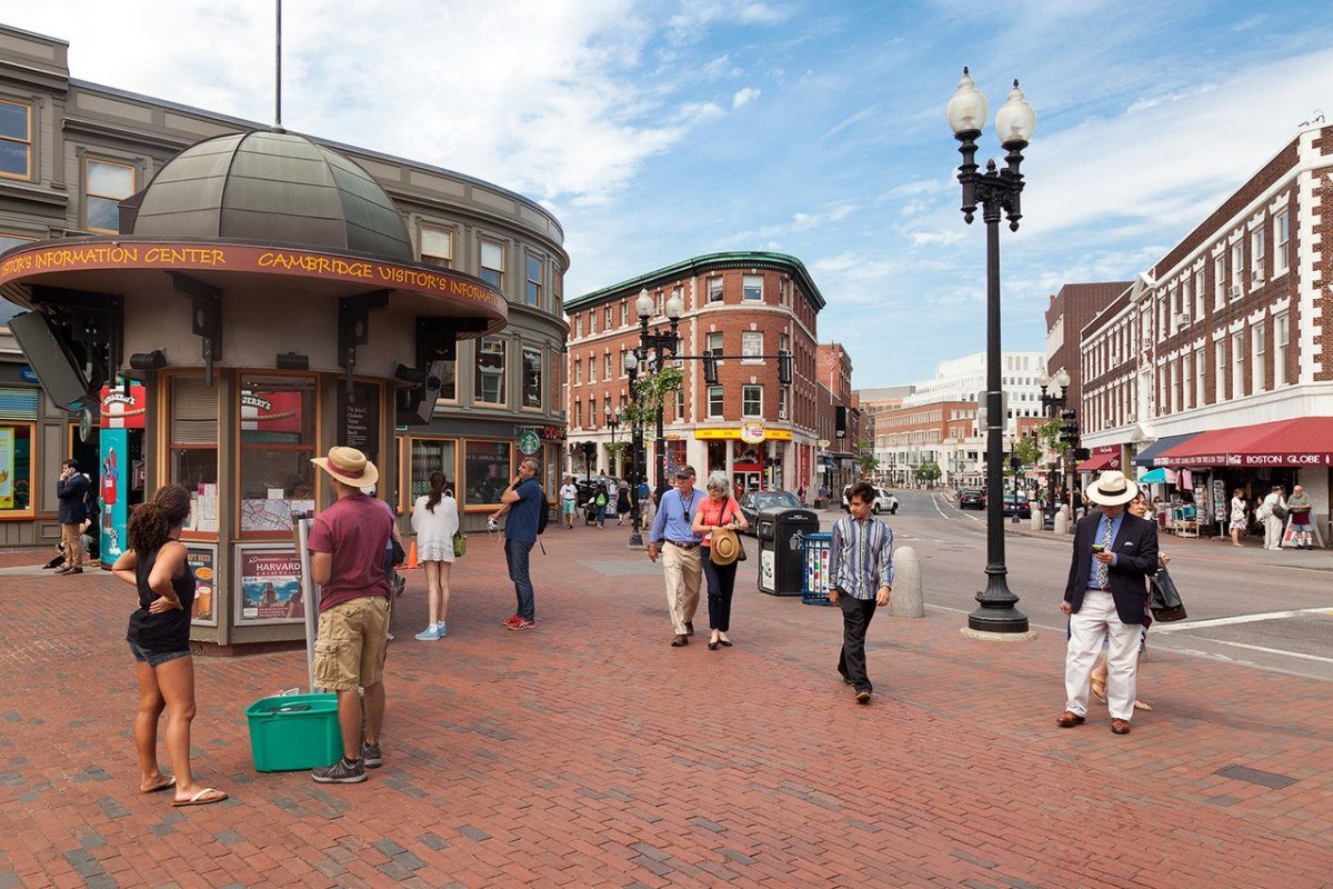 Best Places to Live in Massachusetts 2026: City-by-City Guide Harvard Square Cambridge Massachusetts university city sidewalk cafes