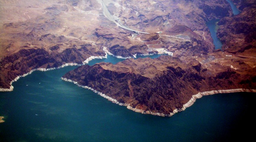 Cost of Living in Nevada 2026: No Income Tax and the California Migration Hoover Dam aerial view Colorado River Nevada Arizona border