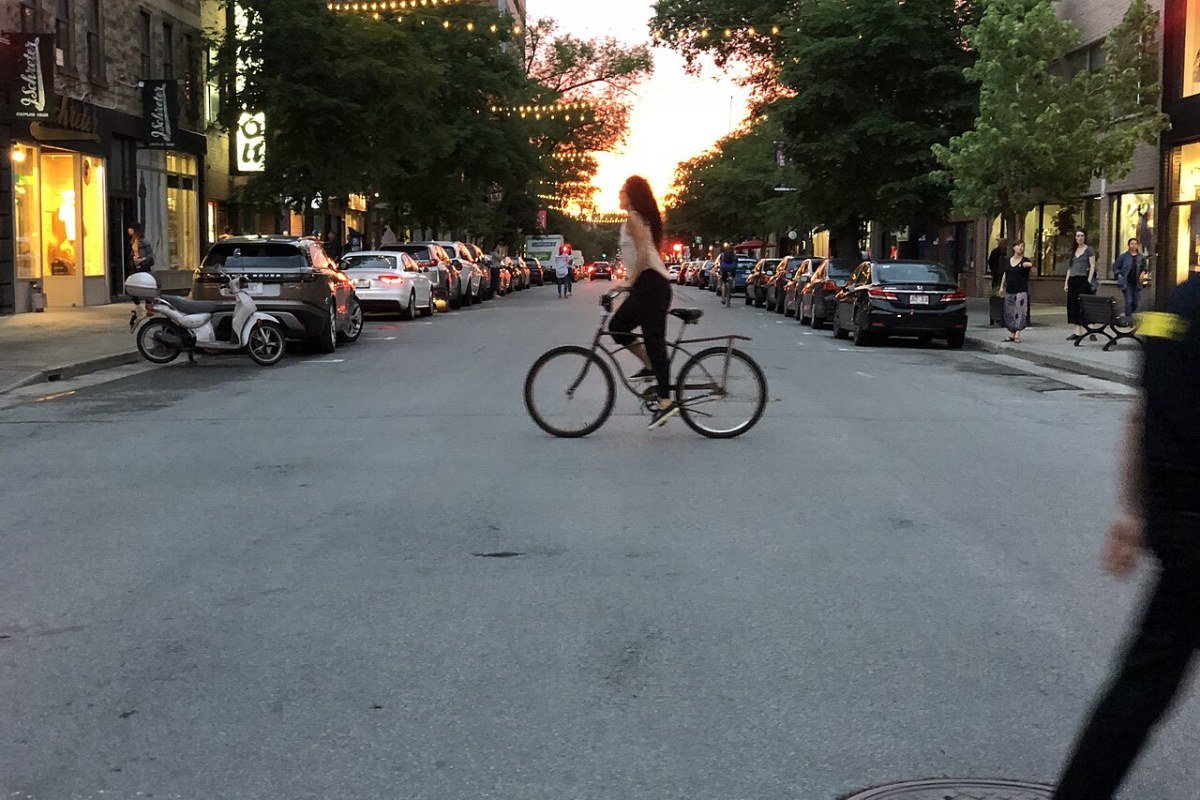 Cost of Living in Quebec 2026: Montreal’s Affordability and Why It Surprises Boulevard Saint-Laurent at sunset on summer solstice Montreal Quebec Canada