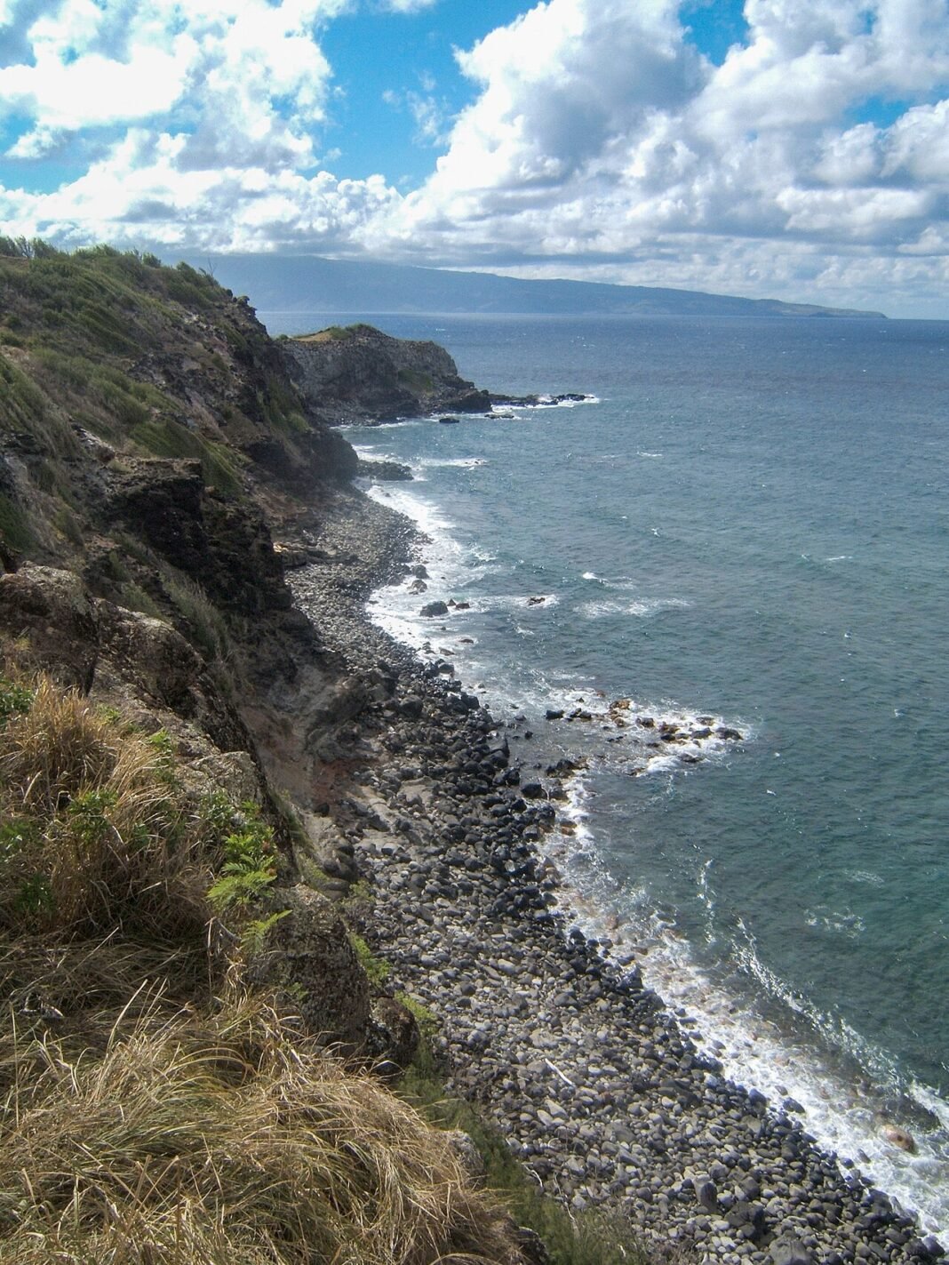 Hawaii Outdoor Activities 2026: The Complete Adventure Guide Rocky volcanic shores of Maui Hawaii waves and coastal landscape