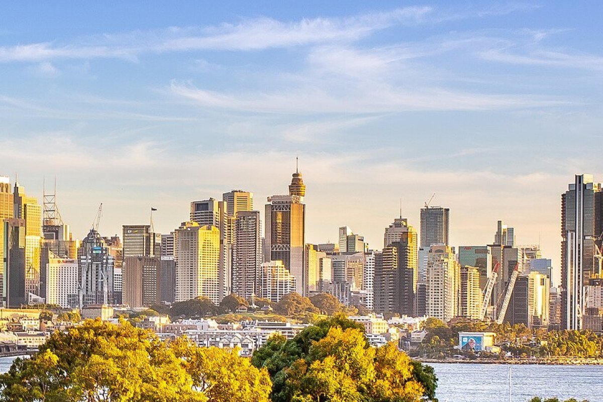 Cost of Living in New South Wales 2026: Sydney Premium and Regional Value Sydney CBD skyline January summer New South Wales Australia glass skyscrapers