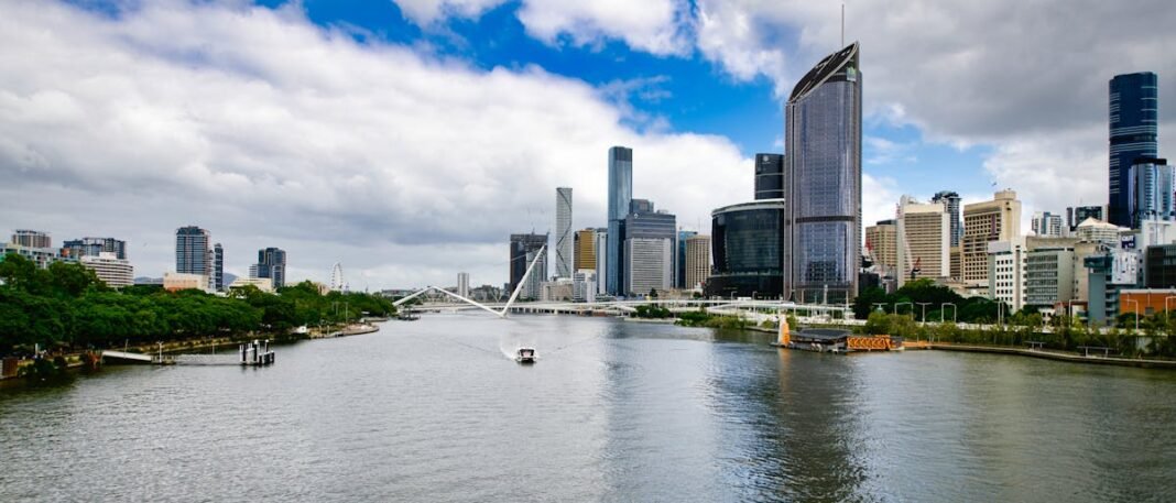 Moving to Queensland in 2026: Complete Relocation Guide Brisbane River and CBD skyline panorama Queensland Australia Story Bridge city