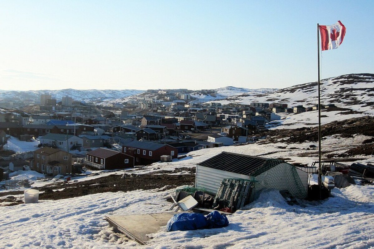 Cost of Living in Nunavut 2026: Iqaluit Prices, Salaries, and the Reality of Arctic Expenses Iqaluit community buildings in winter Arctic landscape Nunavut Canada