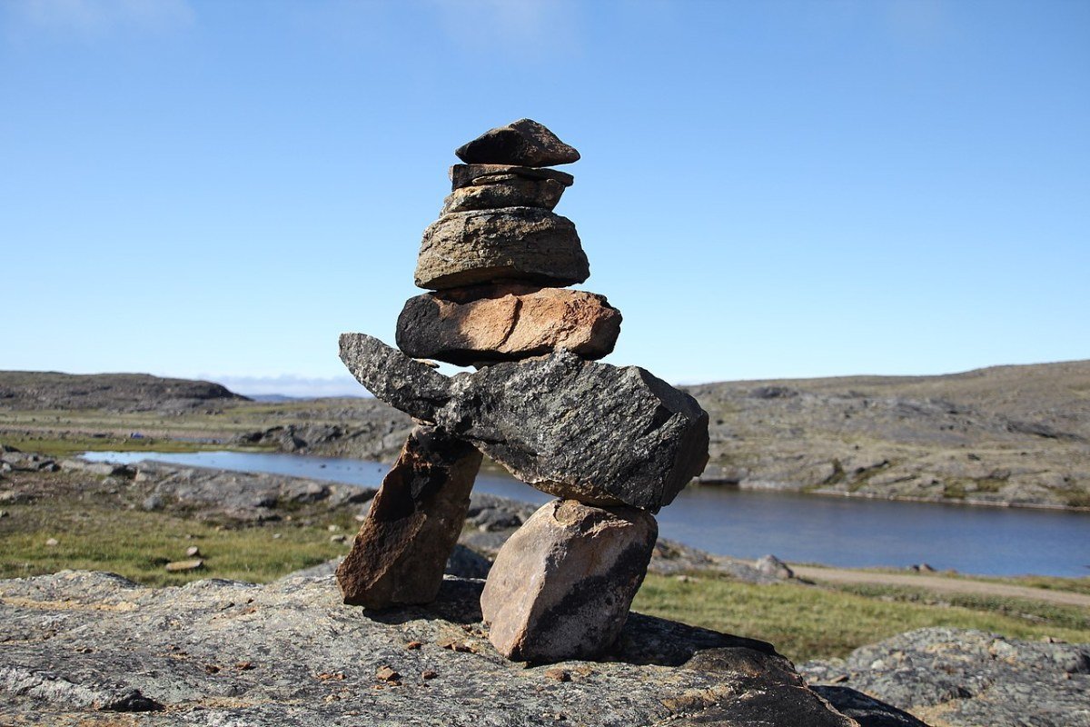 Nunavut Outdoor Guide 2026: Polar Bears, Arctic Wildlife, and the Last Wilderness Baffin Island Arctic wilderness fjord and tundra landscape Nunavut Canada
