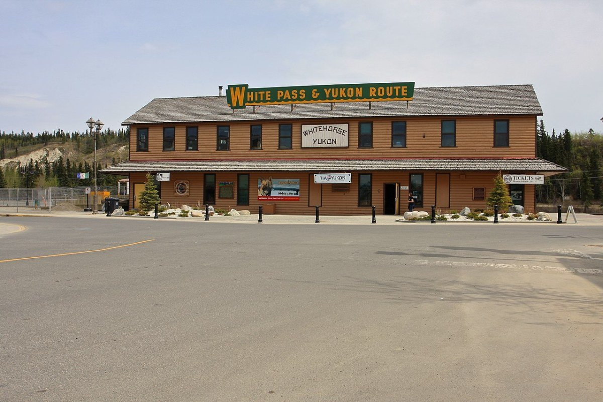 Cost of Living in Yukon 2026: Whitehorse Prices, Salaries, and What to Budget Whitehorse Yukon Canada cityscape viewed from the bluff boreal forest