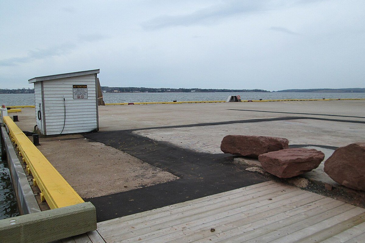 Prince Edward Island Travel Guide 2026: Red Sand Beaches, Anne of Green Gables, and the Gentle Island Charlottetown waterfront boardwalk with colourful buildings Prince Edward Island Canada