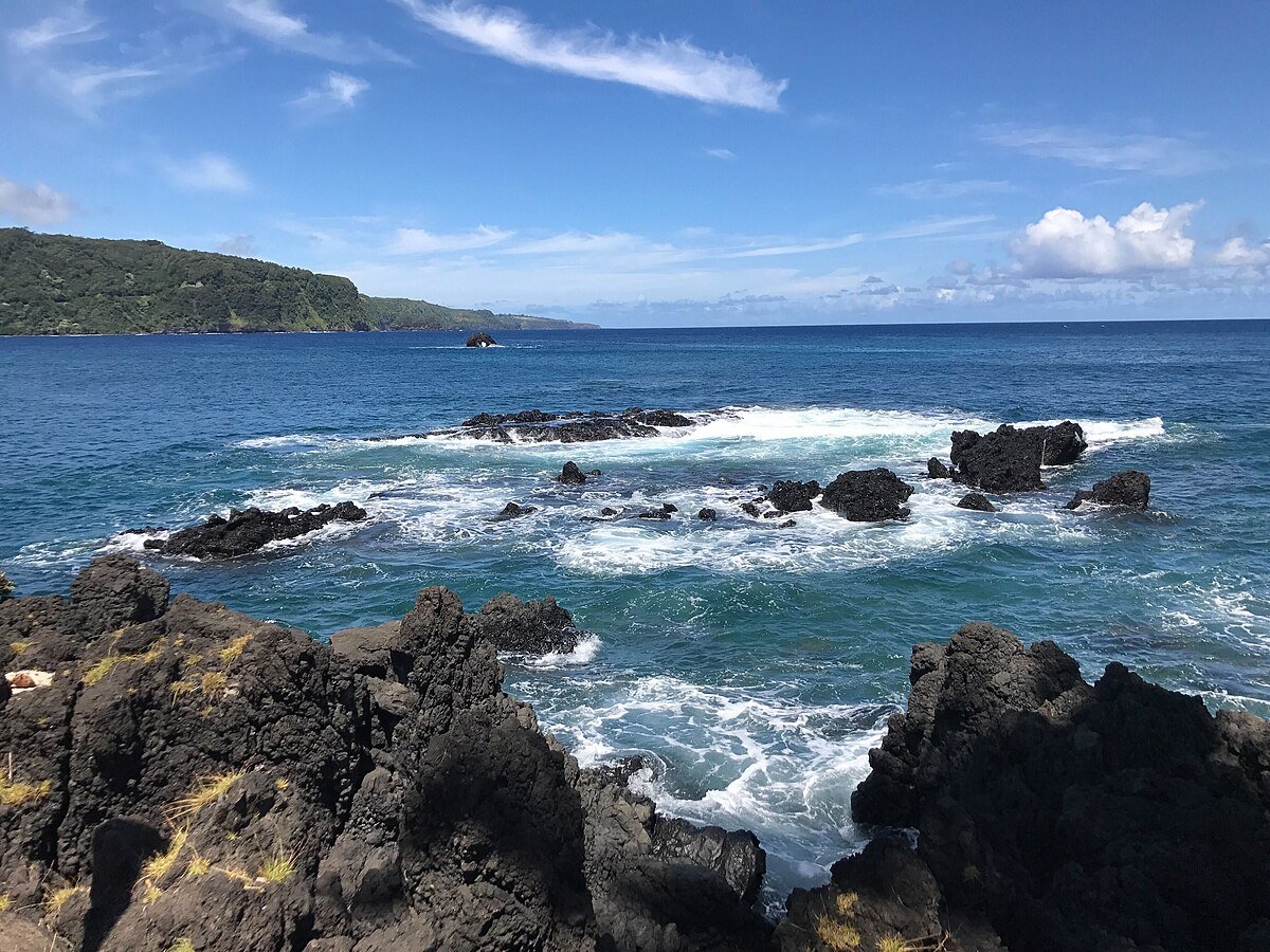 Black rock beach along the Road to Hana Maui Hawaii Pacific Ocean coastal view