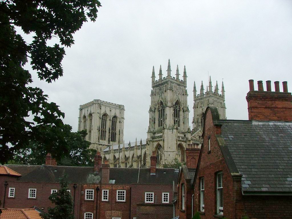 Moving to England 2026: Visa, Housing, Healthcare, and Everything You Need to Know English residential Victorian terrace houses street United Kingdom