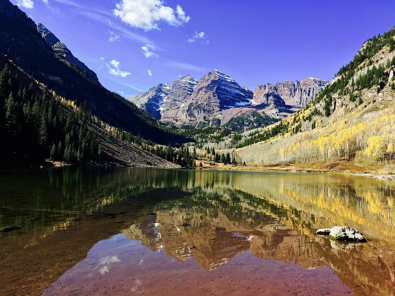 Maroon Bells mountain peaks reflected in Maroon Lake Aspen Colorado Elk Mountains