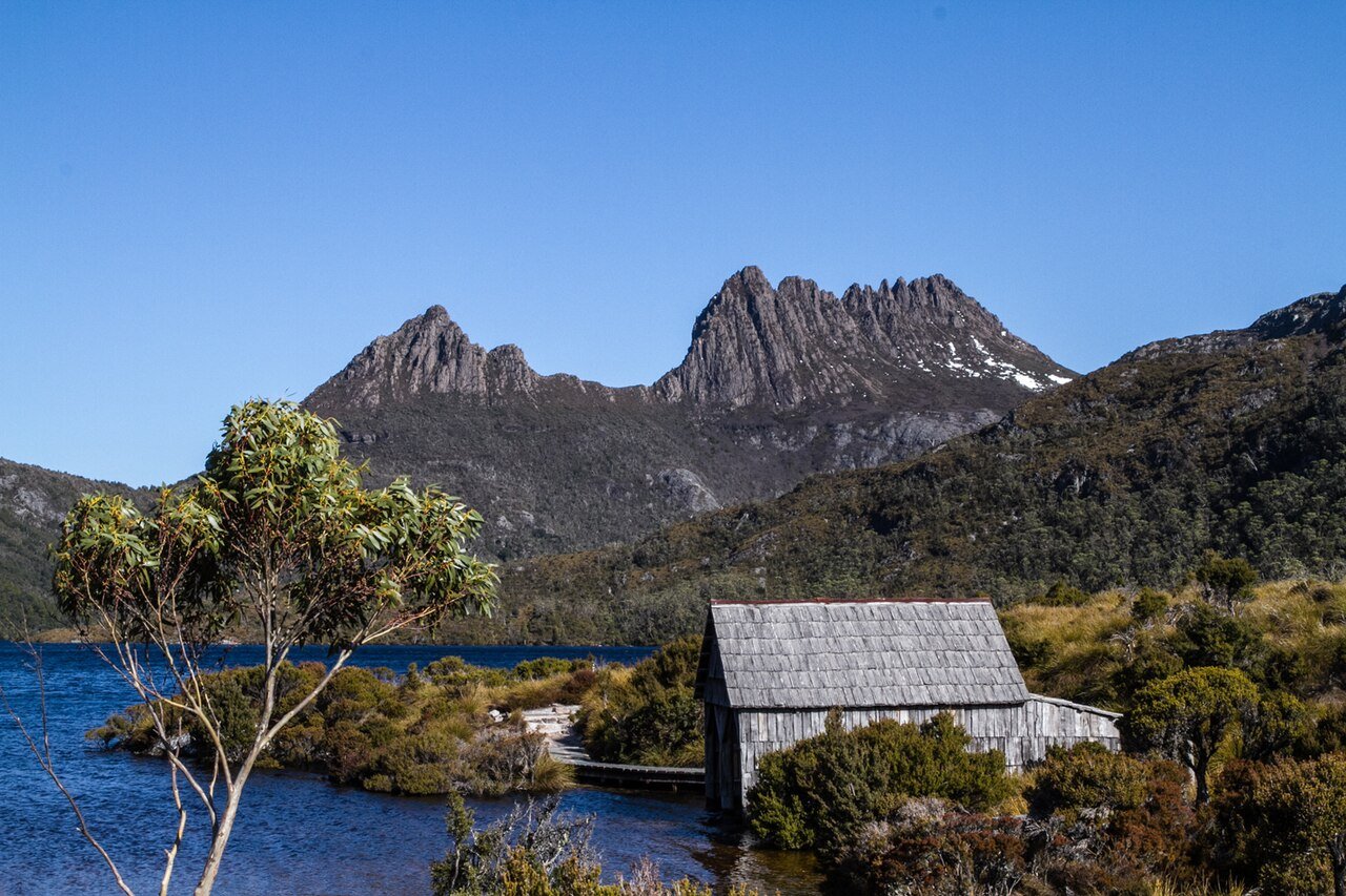 Boat shed and Cradle Mountain at Dove Lake Tasmania Australia wilderness