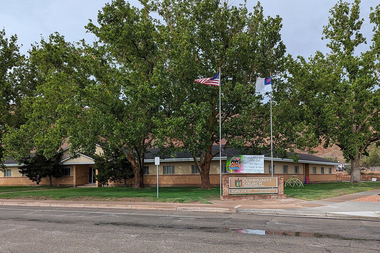 Moab Utah community sign welcoming residents — a small city that has grown rapidly as a destination for outdoor enthusiasts and remote workers
