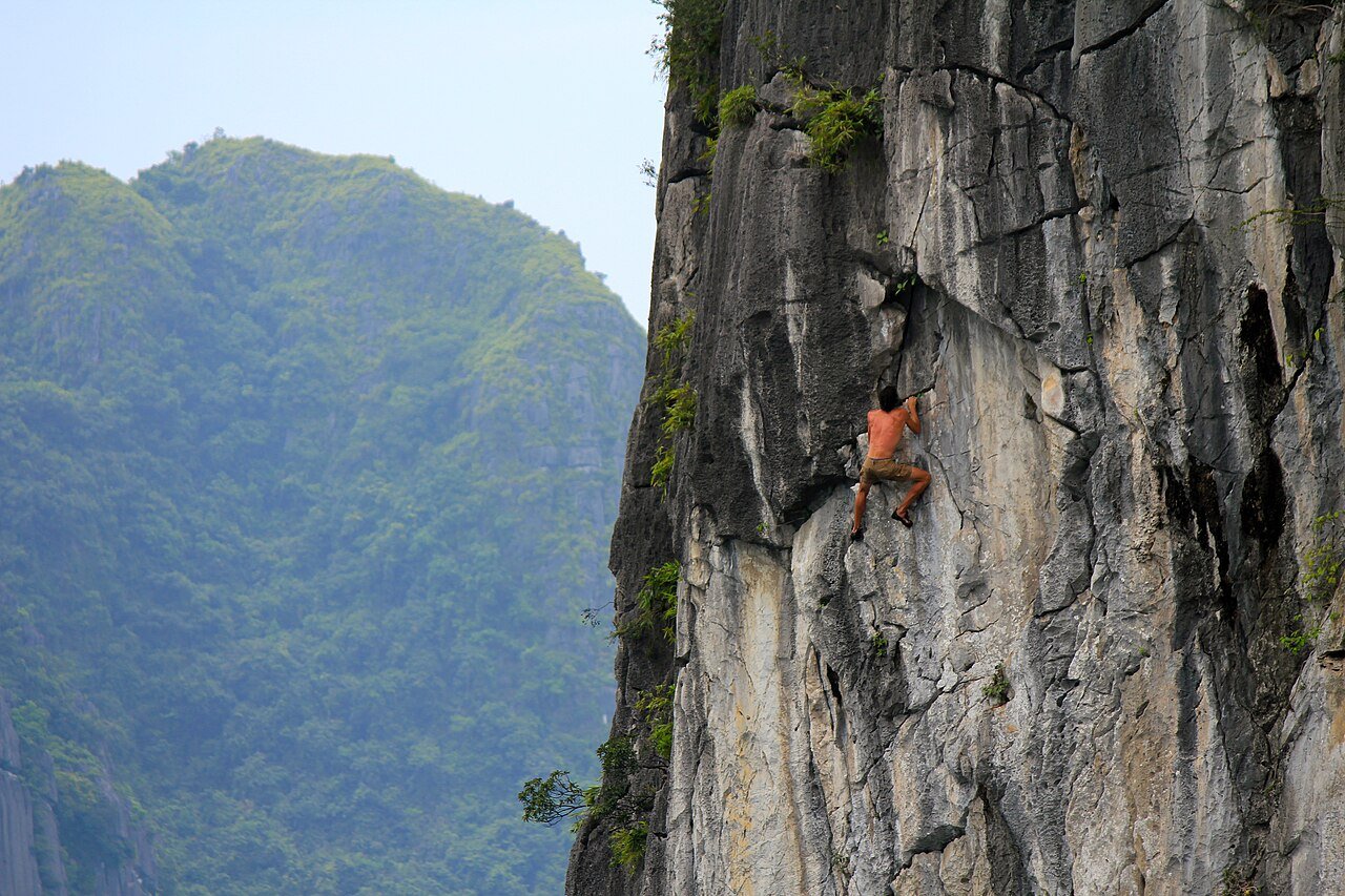 outdoor adventure solo travel Vietnam rock climbing limestone karst landscape active travel freedom independence