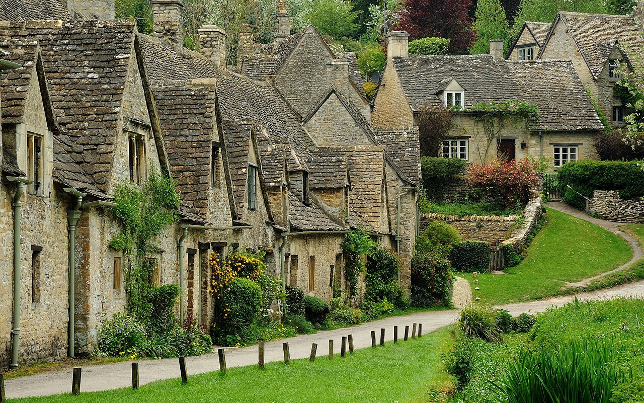 Arlington Row Bibury Cotswolds England 14th century weavers cottages River Coln most photographed English countryside
