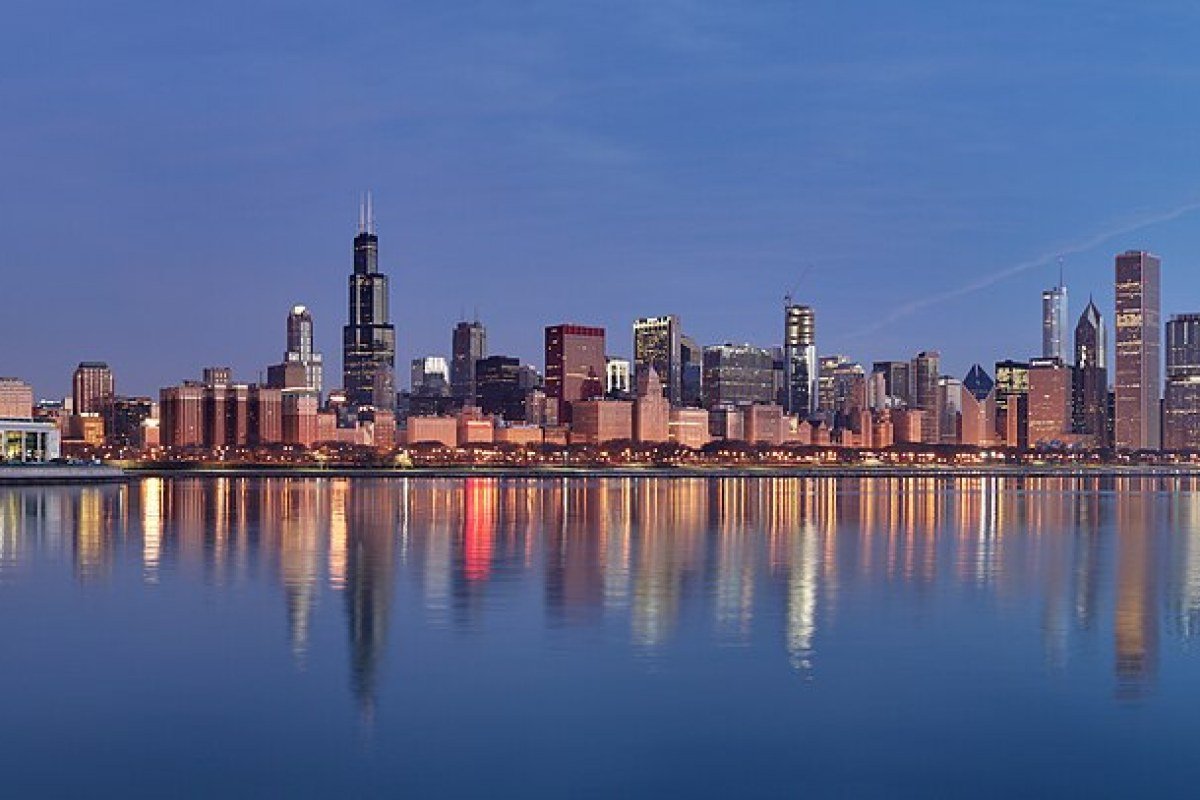 Chicago Insider’s Guide: Architecture, Deep Dish, and the Blues Chicago skyline at sunrise Illinois USA architecture skyscrapers Lake Michigan travel guide