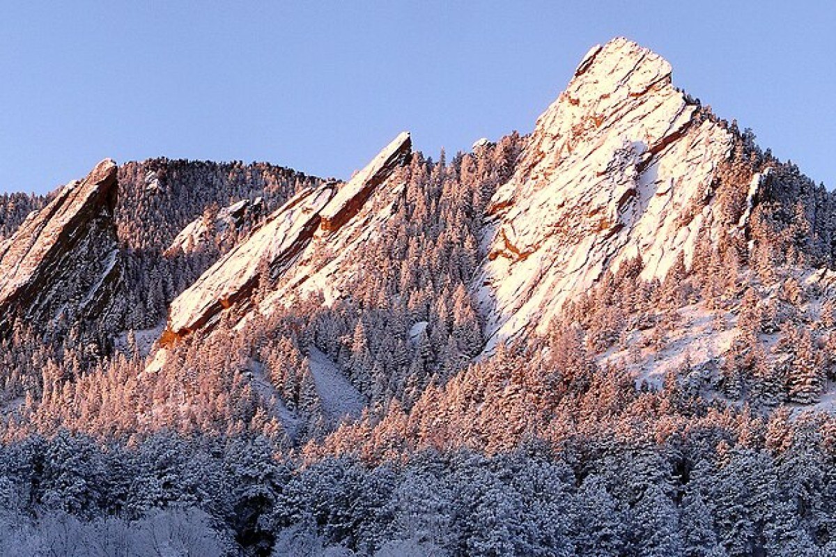 Best Cities to Live in Colorado in 2026: Denver, Boulder, Fort Collins and More Flatirons rock formations at sunrise Boulder Colorado iconic landmark