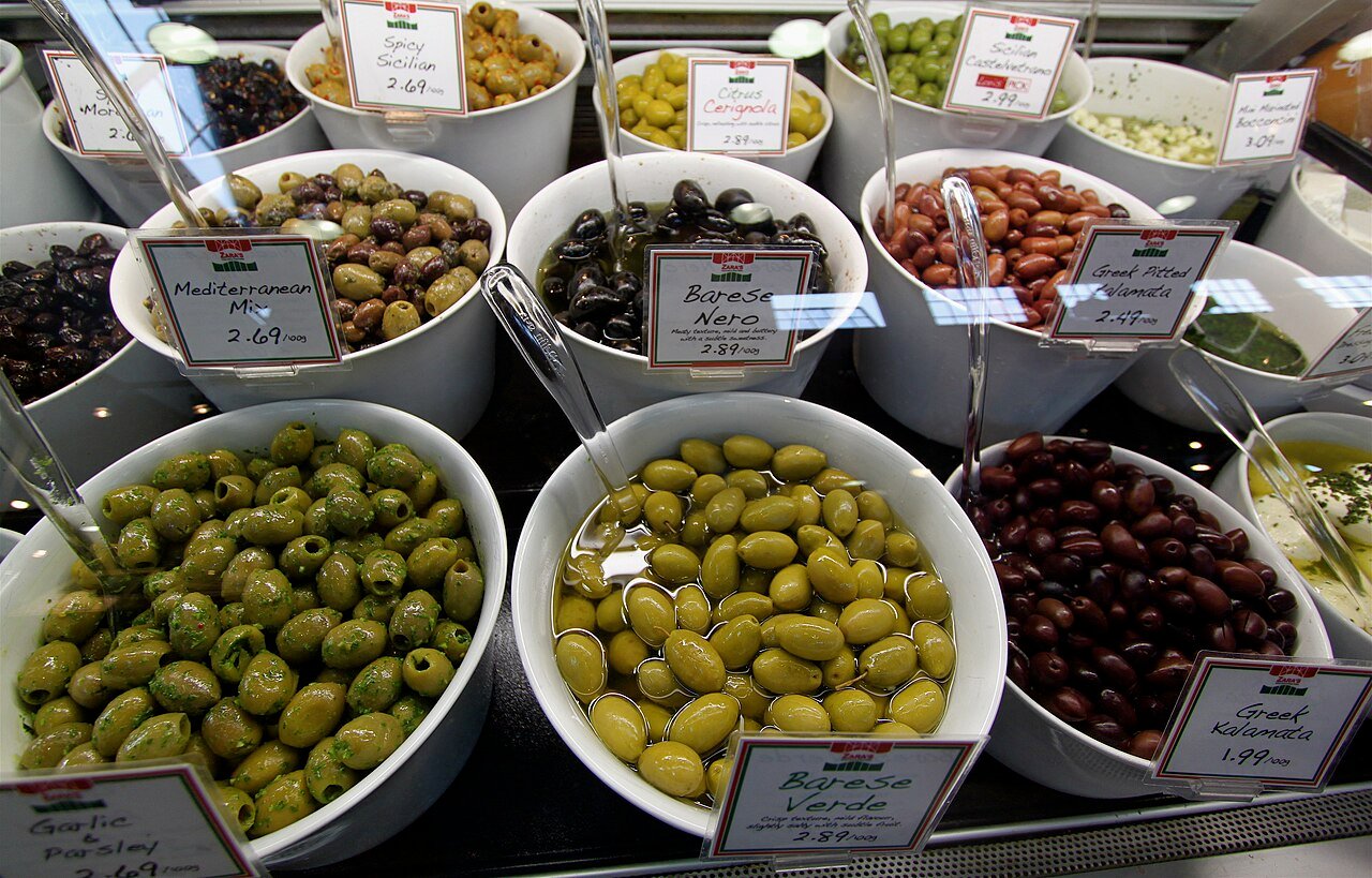 Granville Island Public Market Vancouver British Columbia colourful produce stalls indoor market False Creek