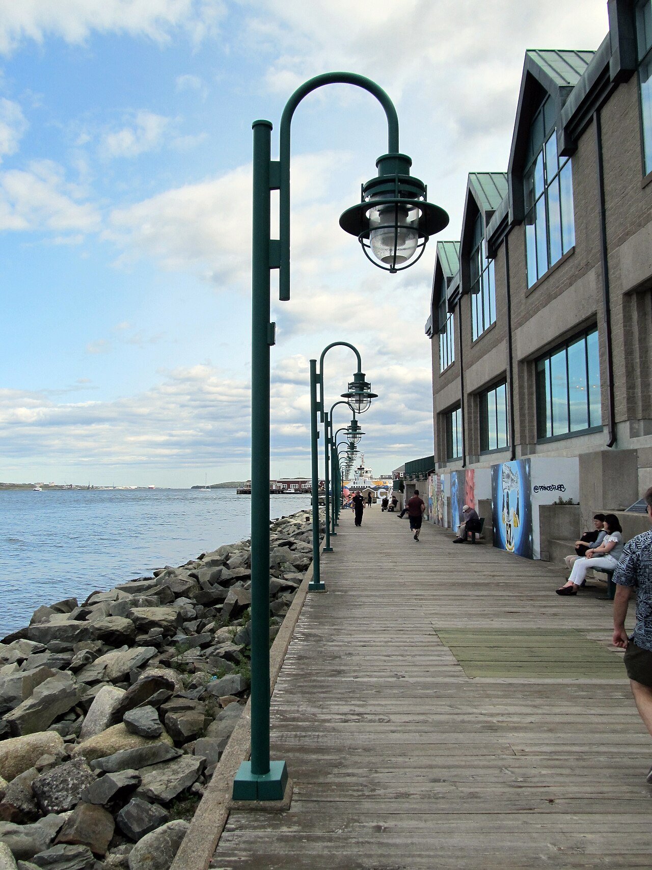 Halifax Boardwalk waterfront with historic stone warehouses — the heart of Nova Scotia's capital and one of the most lively waterfronts in Atlantic Canada