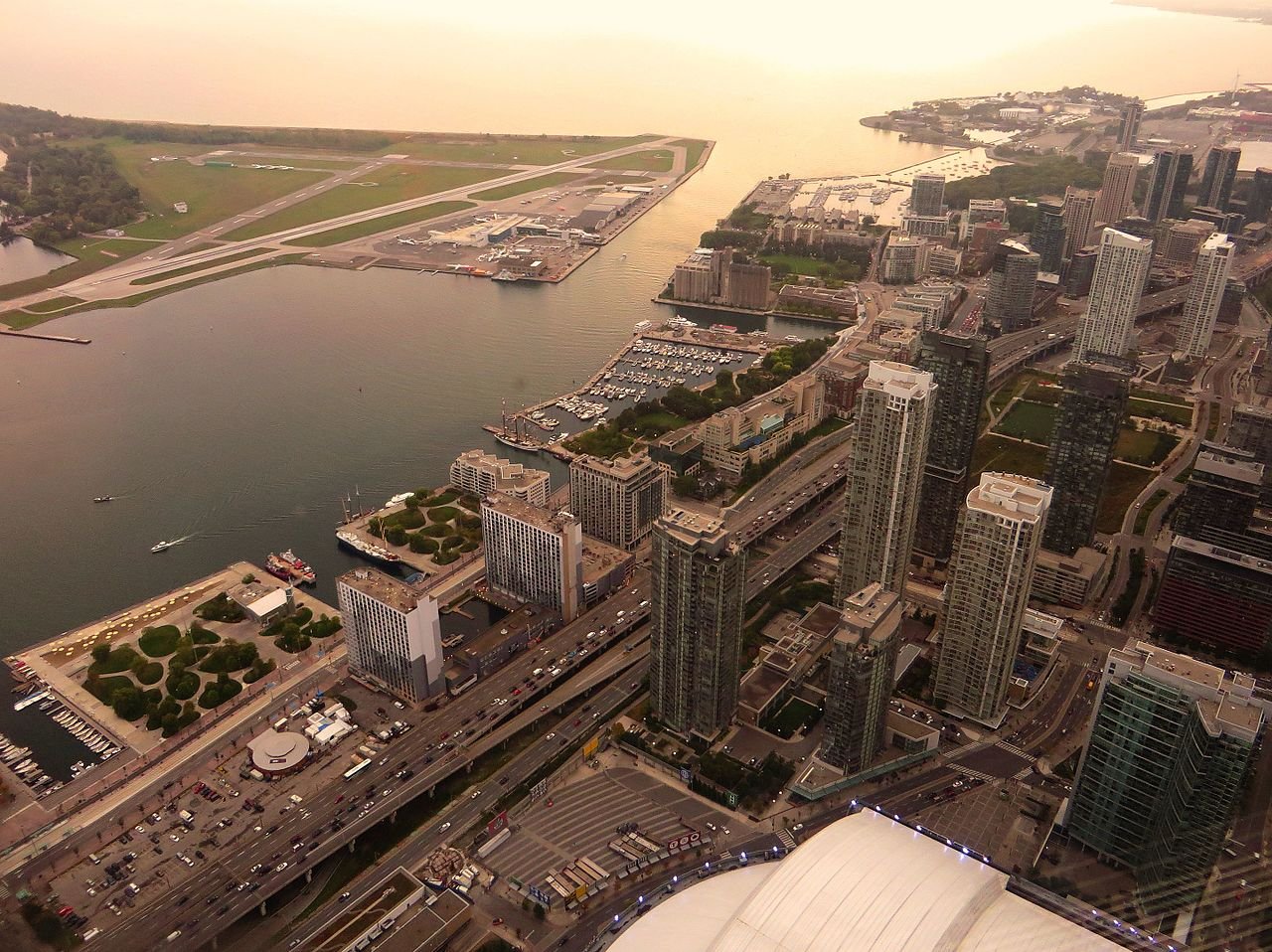 Toronto Harbourfront and Lake Ontario viewed from the CN Tower — the waterfront skyline and islands of Canada's largest city
