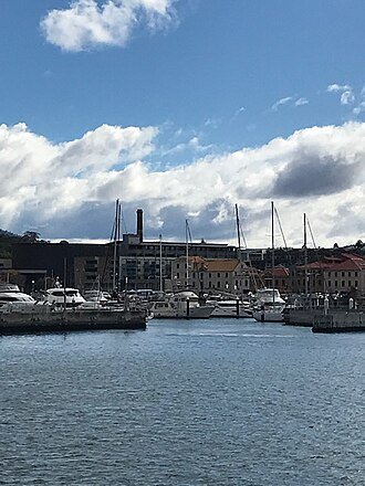 Hobart waterfront Tasmania Australia — the historic sandstone warehouses of Salamanca Place and the harbor of Australia's second-oldest city