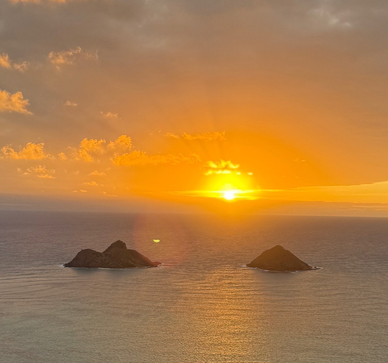 Mokulua Islands sunrise from Lanikai Pillbox hiking trail Oahu Hawaii