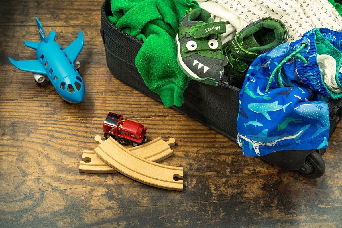 How to Travel on a Budget: 20 Proven Strategies That Actually Work Luggage packed and ready for a budget travel holiday backpacks and suitcases