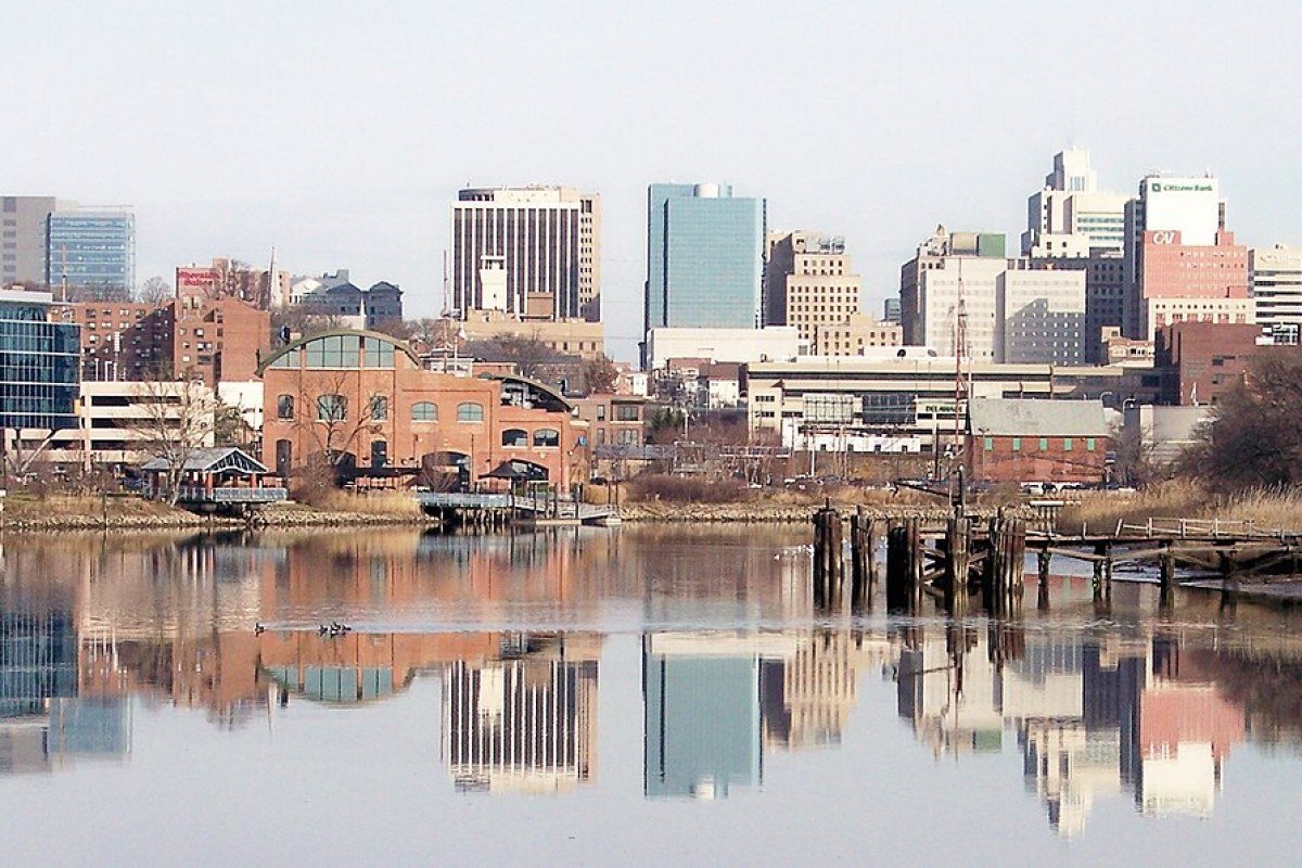 Cost of Living in Delaware 2026: Tax Advantages and Mid-Atlantic Value Wilmington Delaware skyline along the Christina River historic port city