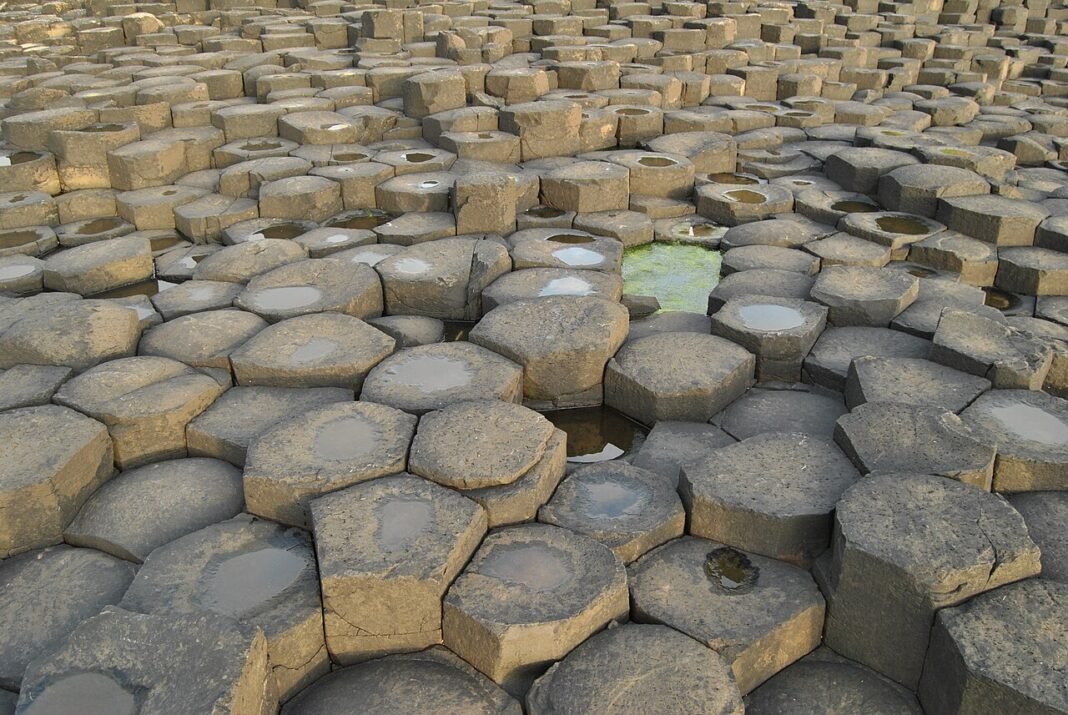 Northern Ireland Travel Guide 2026: Belfast, the Giant’s Causeway, and the Emerald Isle’s Hidden Gem Giants Causeway UNESCO World Heritage basalt columns on the Causeway Coast Northern Ireland