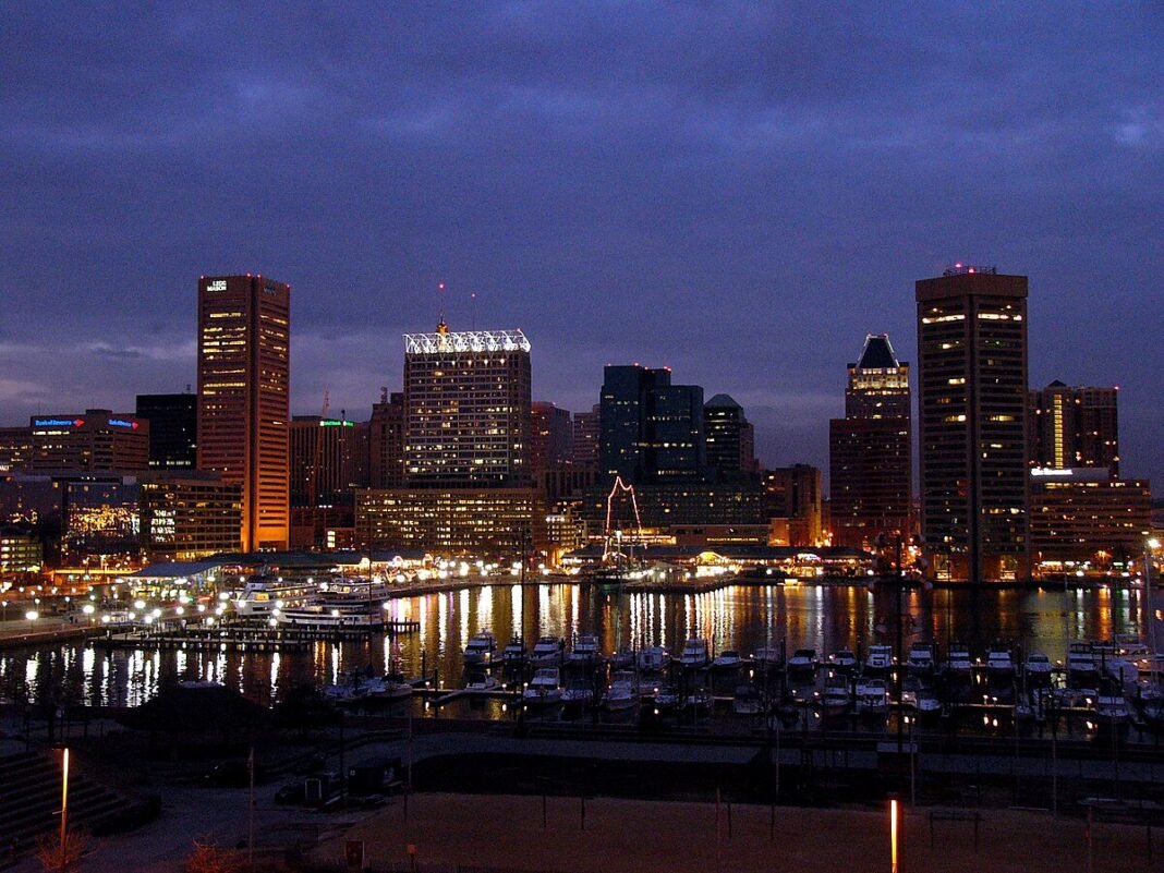 Maryland Travel Guide 2026: Chesapeake Bay, Blue Crabs, and American History Baltimore Inner Harbor viewed from Federal Hill, Maryland