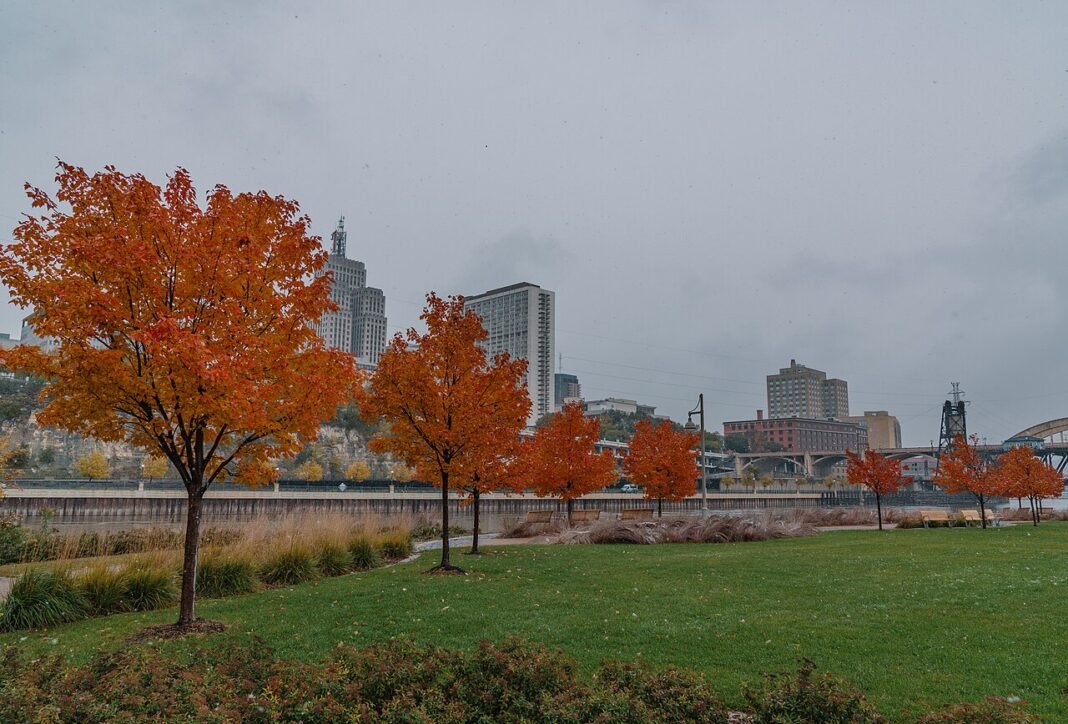Cost of Living in Minnesota 2026: Twin Cities Value and Northern Minnesota Affordability Autumn at Raspberry Island Regional Park, St. Paul, Minnesota