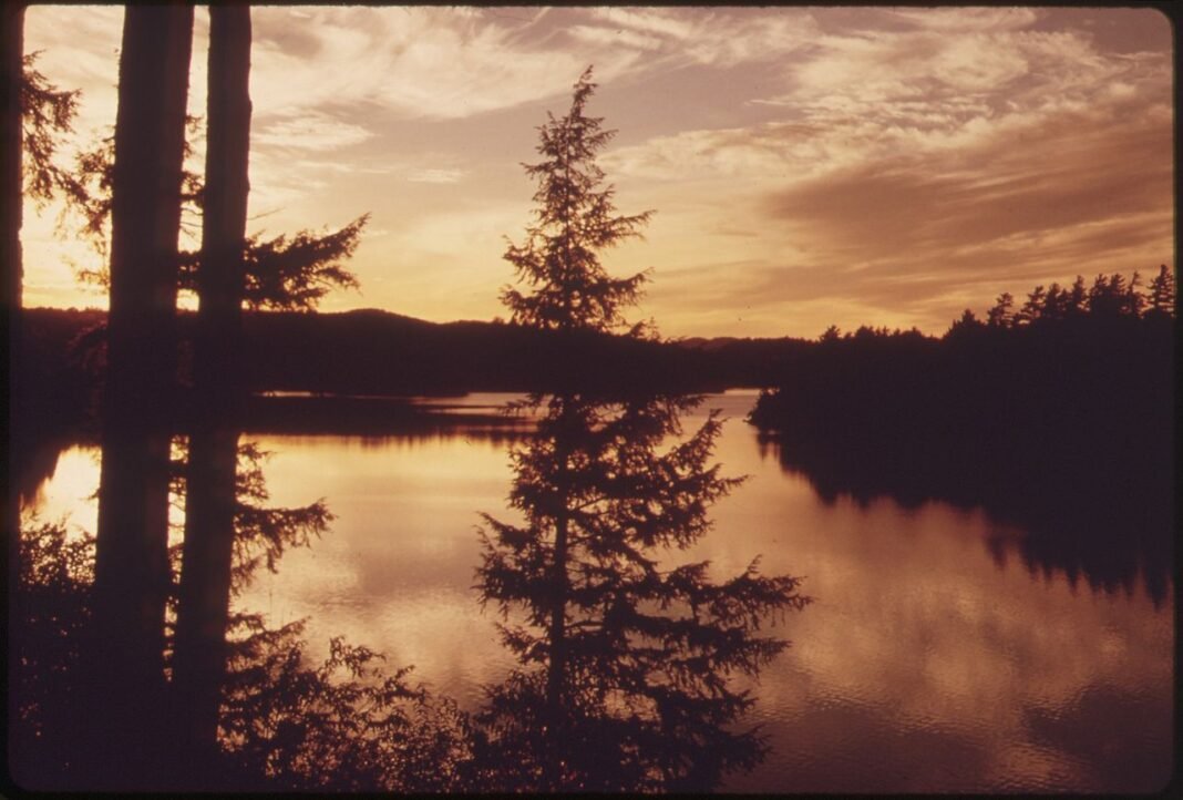 Outdoor Activities in New York 2026: Adirondacks, Finger Lakes, and the Hudson Valley Sunset over Seventh Lake in the Adirondack Forest Preserve, New York