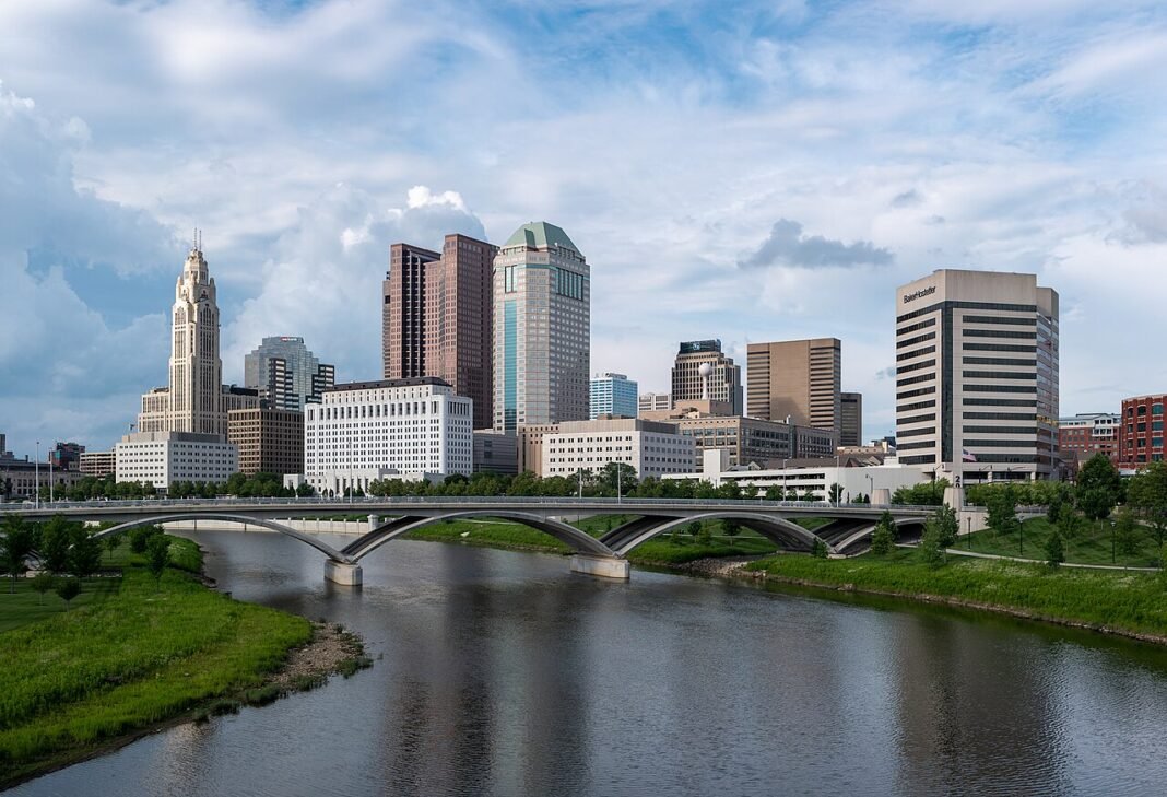Cost of Living in Ohio 2026: Midwest Affordability in a State of Renaissance Cities Downtown Columbus Ohio skyline viewed from Main Street Bridge over the Scioto River