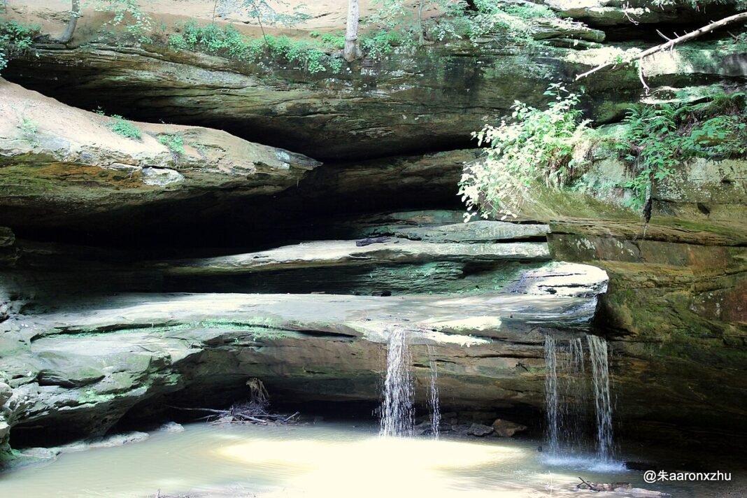 Outdoor Activities in Ohio 2026: Hocking Hills, Lake Erie, and the Appalachian Foothills Creek flowing through Old Mans Cave at Hocking Hills State Park, Ohio