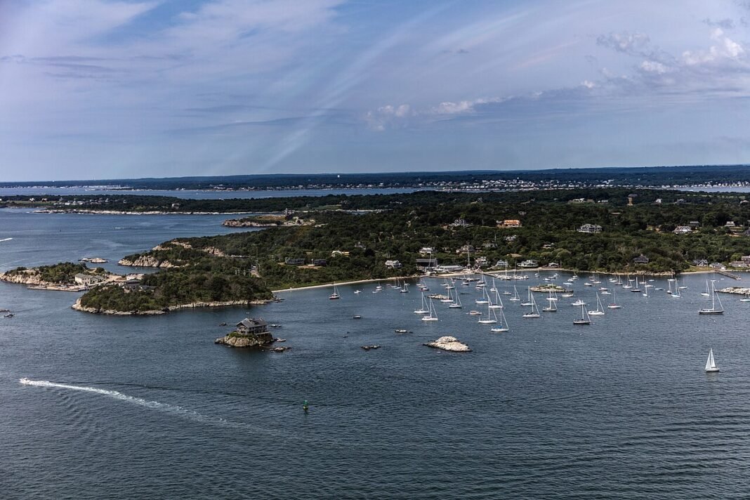 Rhode Island Travel Guide 2026: Newport Mansions, Providence Arts, and New England Coastline Aerial view of Newport Rhode Island and Newport Harbor on Aquidneck Island