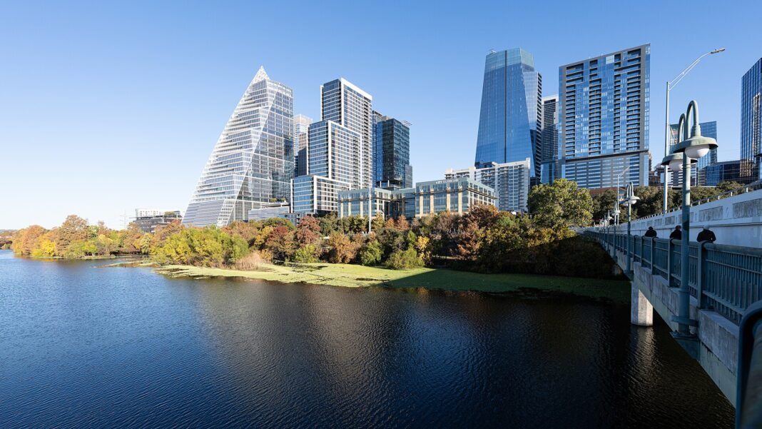Cost of Living in Texas 2026: No Income Tax, High Property Taxes Explained Austin Texas skyline at sunset from the Ann W Richards Congress Avenue Bridge